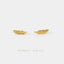 two gold earrings shaped like leaves, with the text "SHEMISLI JEWELS" below them.