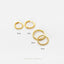 four gold-colored earrings of different sizes, ranging from 6mm to 8mm, arranged on a white background.