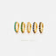 a collection of five gold earrings with gemstones, arranged in a row against a white background.