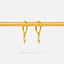a pair of gold hoop earrings with lightning bolt charms hanging from them, displayed on a gold bar.