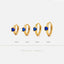 four gold earrings with blue gemstones, each with a different size indicated by the numbers 6, 7, 8, and 9 millimeters. The text "SHEMISLI JEWELS" is present, likely indicating the brand or type of the earrings.