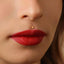 A close-up of a person's face, focusing on their lips and nose.