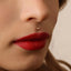 A close-up of a person's face, focusing on their lips and nose.
