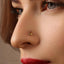 A close-up of a person's face, focusing on their nose and lips.