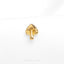 a gold plated brooch with a cross on it