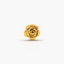 A single, intricately designed gold rose earring is the central focus of the image.