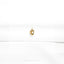 a close up of a white shirt with a gold ring on it