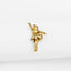 a gold pin with a dancer on it