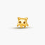 a gold plated charm with a cat's head on it