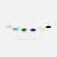 a collection of six gold earrings with various colored gemstones, arranged in a row against a white background.