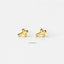 Two gold cross-shaped earrings are shown against a white background.