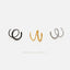 Three spiral earrings in black, gold, and silver colors are displayed against a white background.