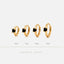 four gold earrings with black stones, each with a different size indicated by the numbers 6, 7, 8, and 9 millimeters.