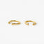 Two gold-colored earrings with a twisted design and small round balls at the ends are shown against a white background.