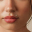 A close-up of a person's face, focusing on their lips and nose.