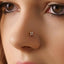 A close-up of a person's face, focusing on their nose and eyes.