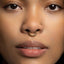 A close-up of a person's face, focusing on their nose and mouth area.