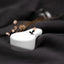 a black and white object on a black cloth