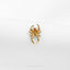 a gold ring with a spider on it