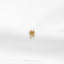 a gold spider ring sitting on top of a white cloth