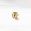 a gold pin with a bat on it