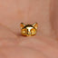 a gold cat shaped ring sitting on top of a person's hand
