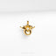 a gold pendant with a crown on top of it