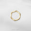 A gold ring with a hexagonal shape is displayed against a white background.