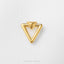 A gold-colored triangular pendant with a pointed top, resting on a white textured background.