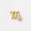 A single, shiny gold letter "M" on a white background.