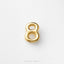 A single, shiny gold number 8 is centered against a white background.