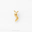 A single, shiny gold-colored object resembling a snail or slug is shown against a plain white background.