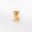 A single, shiny gold hourglass-shaped object is centered against a plain white background.