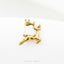 A small golden deer figurine is shown against a white background.