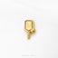 A gold-colored pong paddle with a ball attached to it, placed on a white background.