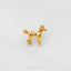 A small gold-colored poodle earring is shown against a white background.