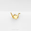 A gold-colored origami crane earring is shown against a white background.