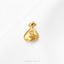 A single gold-colored pendant in the shape of a bag with a dollar sign on it, placed on a white background.