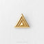 A gold-colored triangular object is centered on a white background.