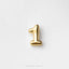 A single, shiny gold number one is centered against a white background.