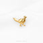 A small gold-colored bird pin is displayed against a white background.