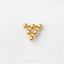 A gold-colored metal object resembling a triangular shape, possibly a piece of jewelry, is shown against a white background.