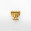 A gold menorah with a single candle is displayed against a white background.