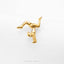 A gold-colored figurine of a human performing a handstand pose is shown against a white background.