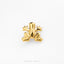 A gold frog-shaped object is shown against a white background.