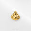A small golden Buddha statue is displayed against a white background.