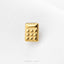 A small gold-colored calculator-shaped object is shown against a white background.