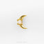 A gold-colored crescent moon-shaped earring with a white opal stone in the center.