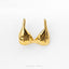 A pair of gold-colored earrings with star-shaped designs on the top.