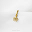 A gold-colored octopus charm is shown against a white background.